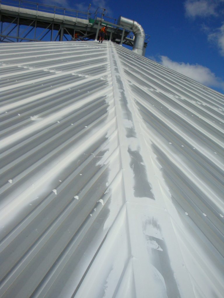 Step 6: Roof sealed externally: all flashings, joints, bolts, and penetrations sealed with Glo-Mastic. Large